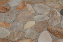 stone pebble paving floor gold colors