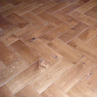 Herringbone parquetry pattern, in rustic grade French oak
